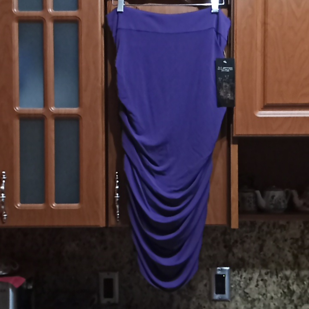 BEBE 3 in 1 Garment. Mini Skirt, Pencil Skirt & Dress. NWT. Beautiful Purple!(M)